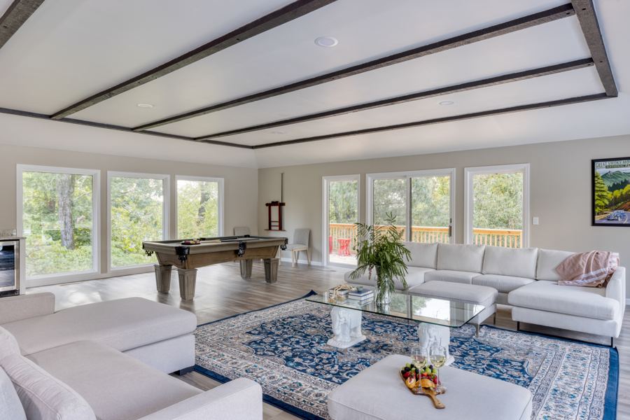 Main house living room with stone fireplace